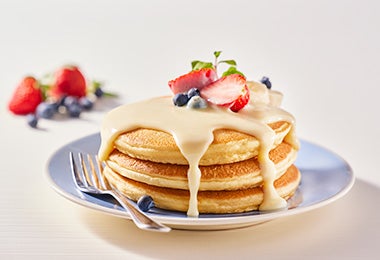 Receta de pancakes bañados con leche condensada